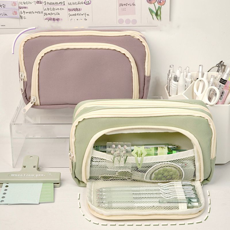 Supplier image of purple and green stationery pouches, one shown open
