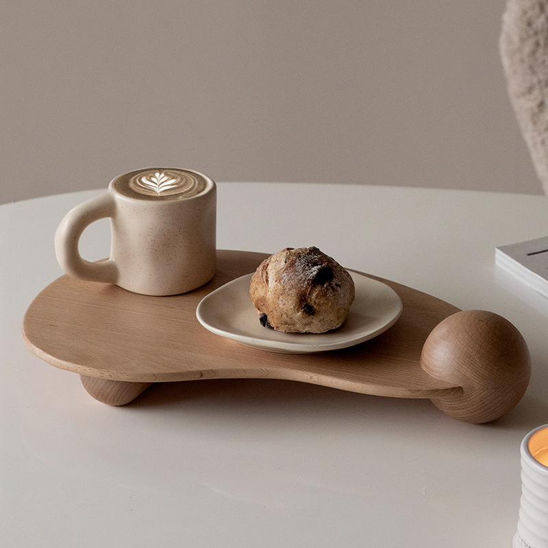 Supplier image of an irregular wooden tray with styling props